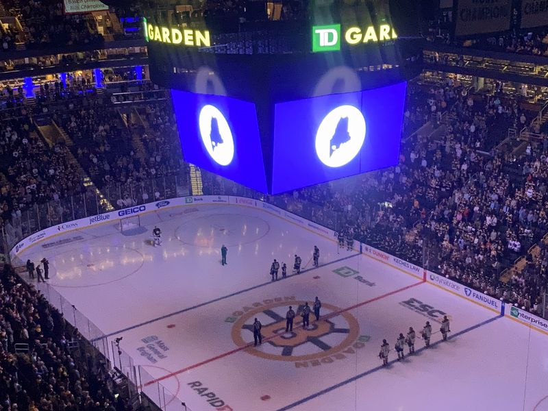 Bruins honor Lewiston shooting victims before game.