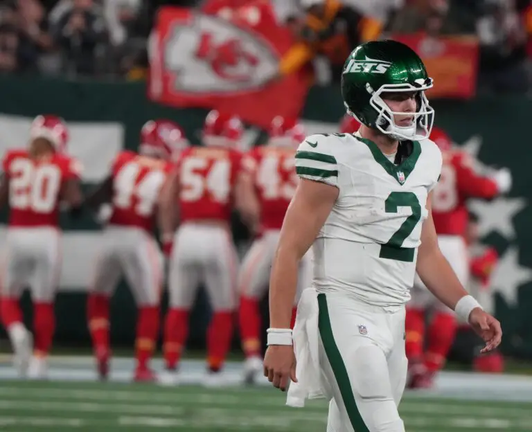 Zach Wilson, the quarterback for the New York Jets, reacts to a crucial mistake against.City of Kansas Chiefs.
